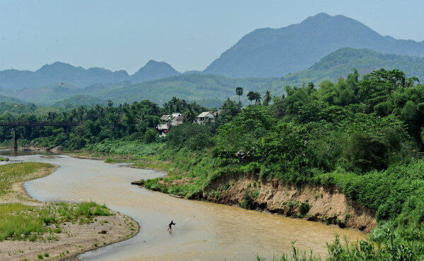 The rolling hills and lush forests of Laos conceal a deadly menace left behind by America
