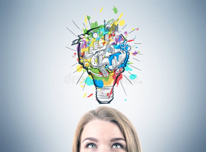Blonde woman s head, a light bulb scheme. Close up of a blonde woman s head. She is standing near a gray wall and looking upwards. A light bulb scheme is drawn royalty free stock image