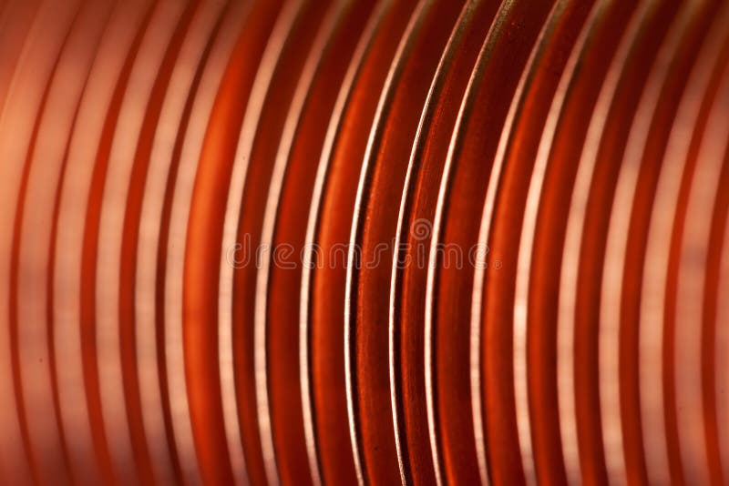 Close-up flat copper twisted plates at the factory. For the manufacture of powerful professional equipment for ships and aircraft construction. Concept of large stock photos