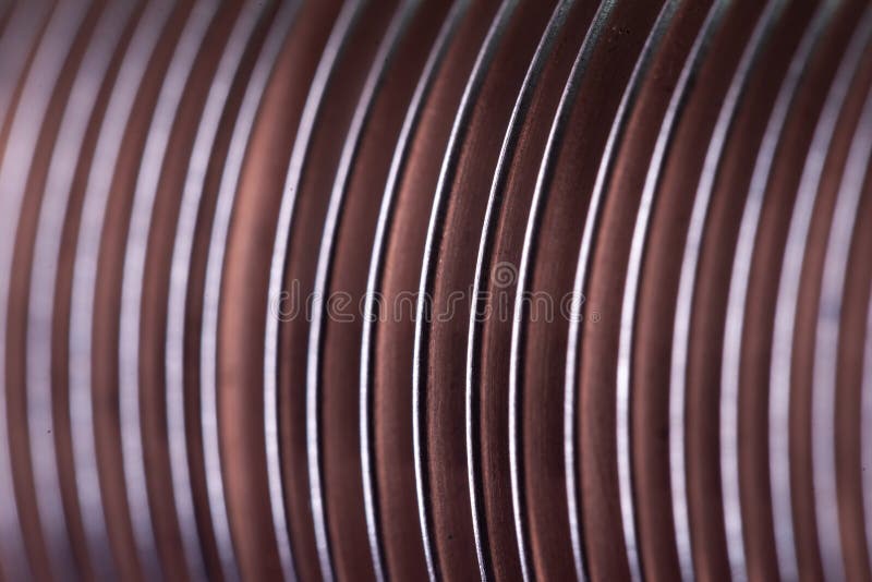 Close-up flat copper twisted plates at the factory. For the manufacture of powerful professional equipment for ships and aircraft construction. Concept of large royalty free stock image