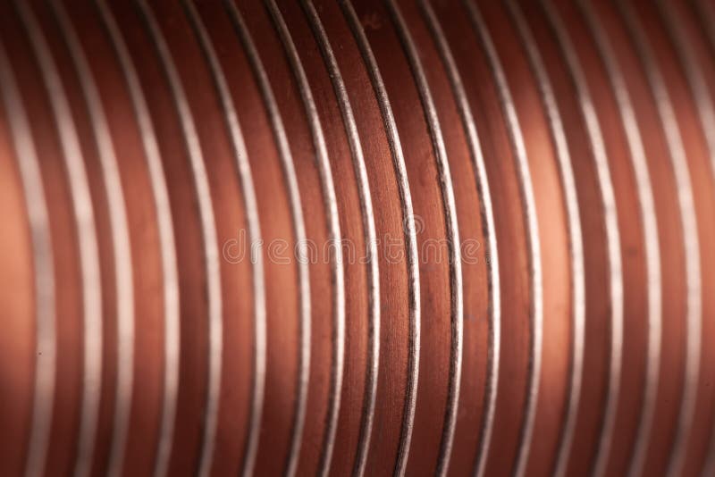 Close-up flat copper twisted plates at the factory. For the manufacture of powerful professional equipment for ships and aircraft construction. Concept of large stock images