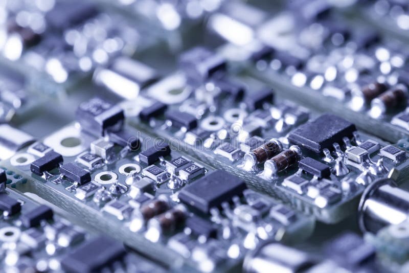 Closeup small microcircuits lie next to each other stock photo