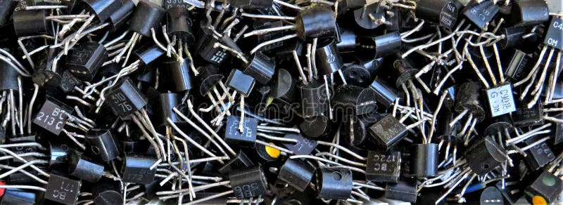 Closeup view of many transistors together in a box. A closeup view of many transistors together in a box stock photography