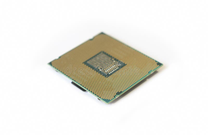 The computer the processor on a white background. Computer the processor on a white background is isolated gold color with a microcircuit royalty free stock image