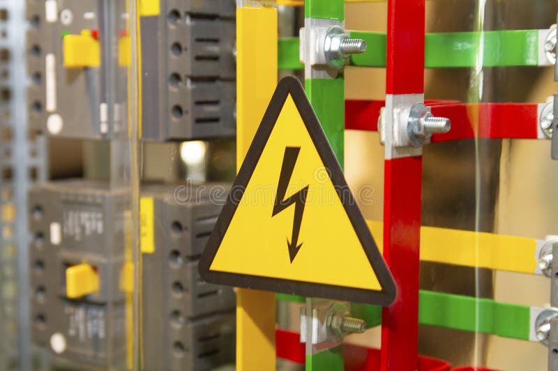 High voltage sign on a modern electric shield. Industry stock image