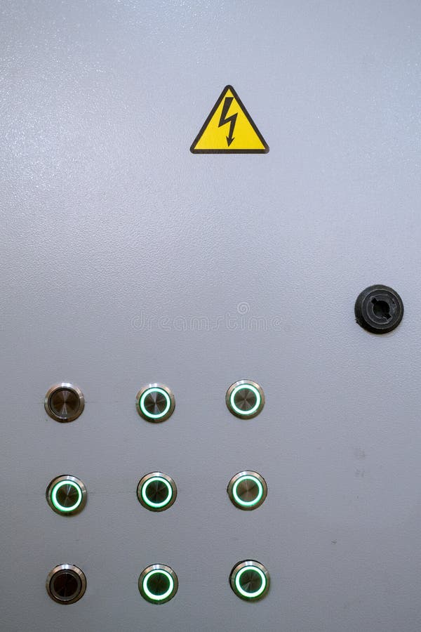 Industrial background. Electric shield with control panel with buttons for switching on and off electrical equipment. Close-up stock photography