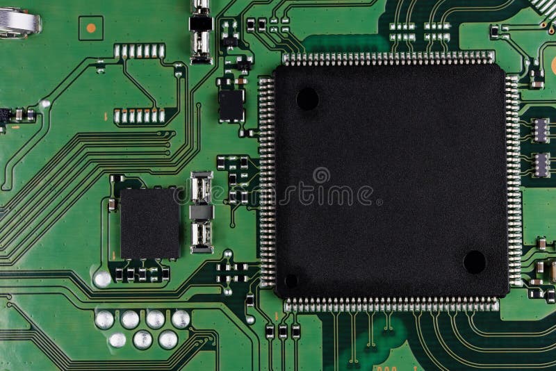 Microchips and microcircuits are installed on a modern electronic circuit board macro. Microchips and microcircuits are installed on a modern electronic circuit stock photos