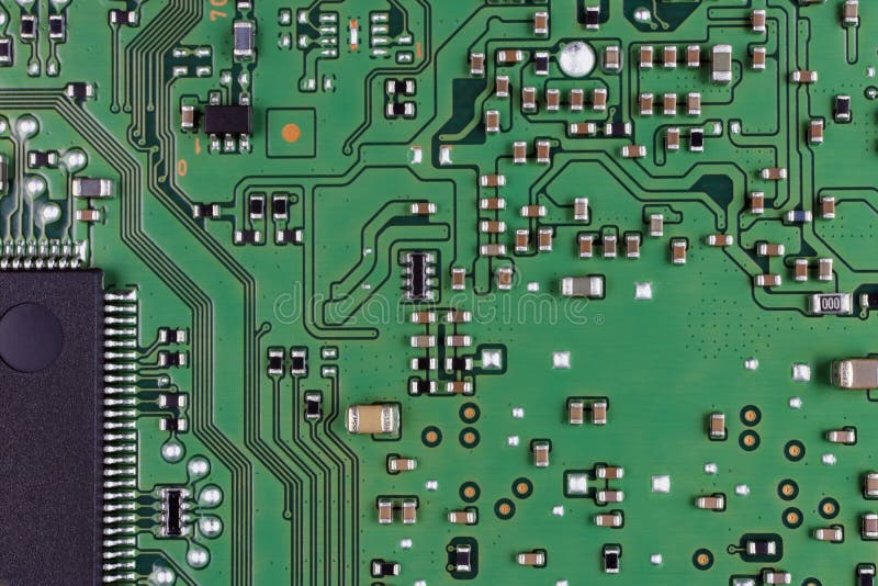 Microchips and microcircuits are installed on a modern electronic circuit board. Mass production. Super macro studio concept stock photos