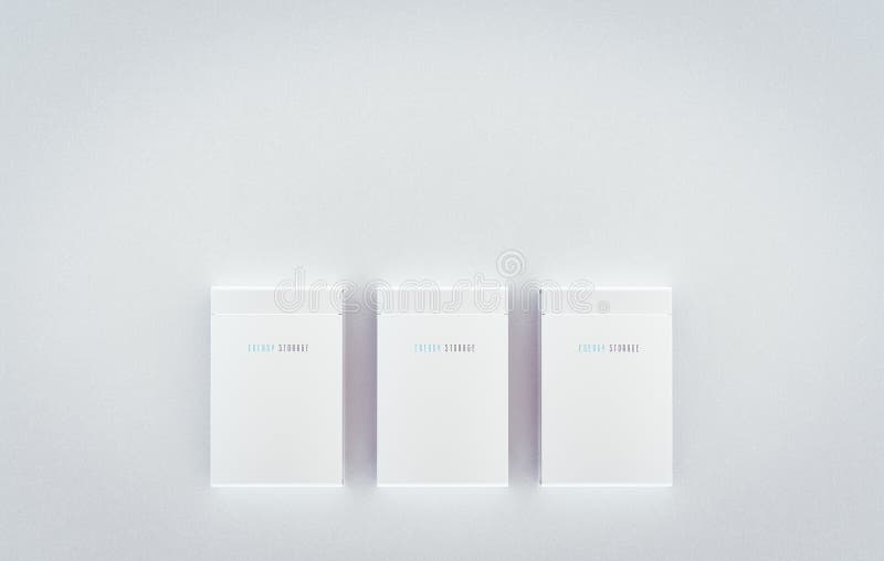 Mock up of a residential integrated battery energy storage system. Multiple modern white batteries mounted on clean wall. 3d rendering stock illustration