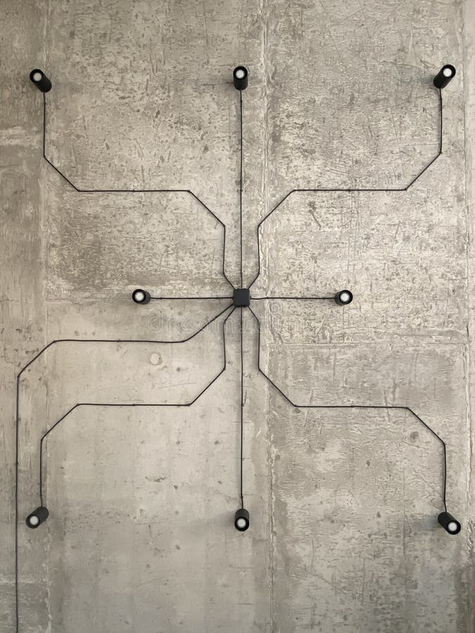Modern loft style concrete ceiling with black spotlights. External wiring with switchboard as a design element. Plan scheme of the. Ceiling in top view stock photo
