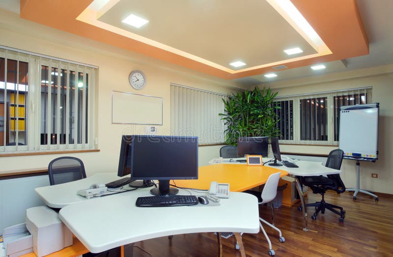 Office interior. Interior of an office, modern and simple furniture and lighting equipment stock images