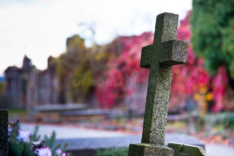Old Cross in the Autumn Cemetery stock images