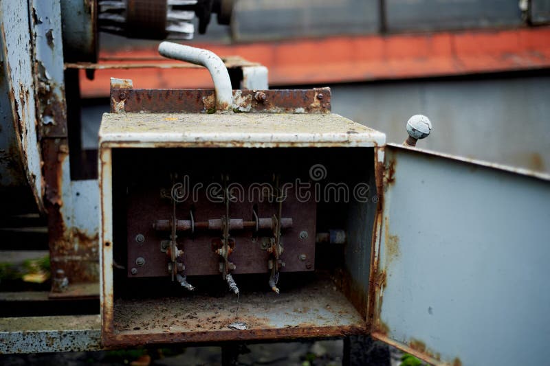 Old rusty electric shield in an abandoned building.Retro. Old rusty electric shield in an abandoned building. Retro stock photos